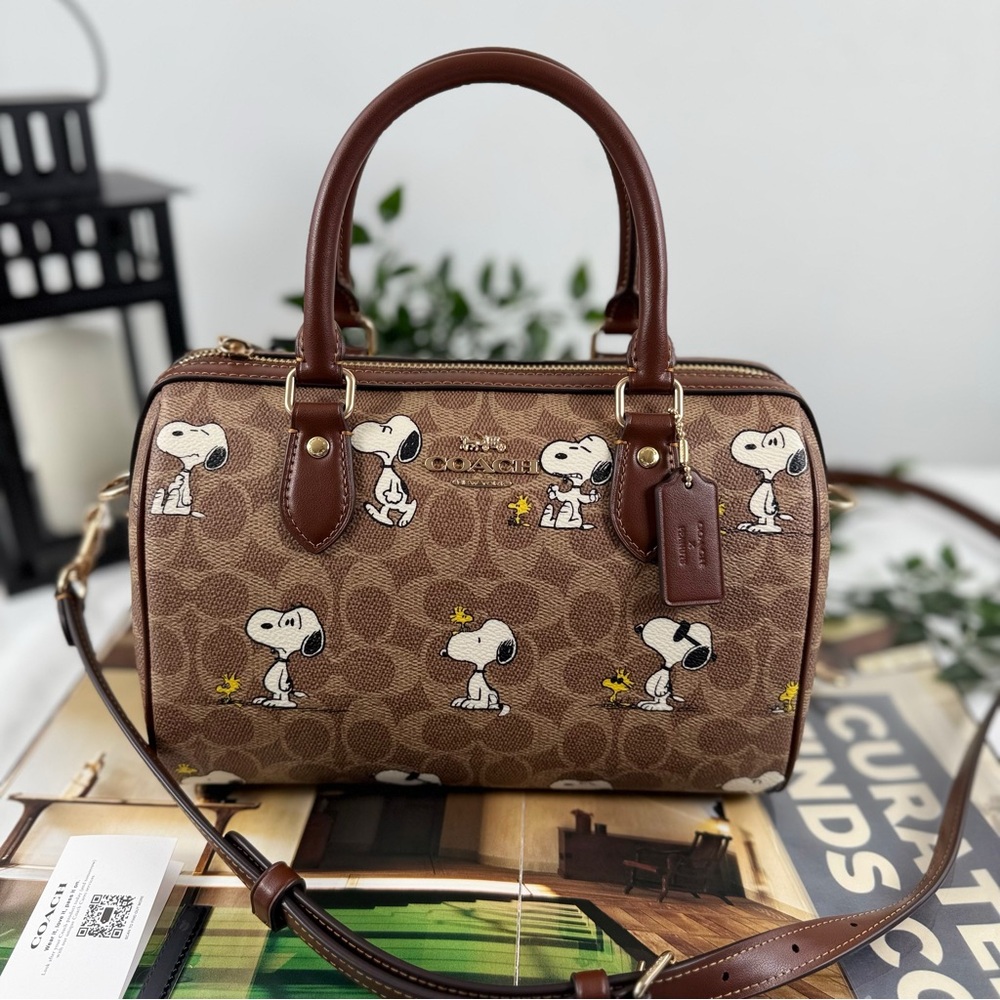 SOLDCoach X Peanuts Rowan Satchel Bag In Signature Canvas With Snoopy Print - Picture 1 of 15
